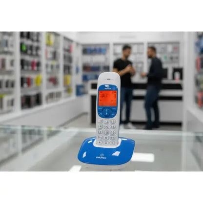 Telefono Cordless Brondi con display arancione e supporto blu, ideale per uso domestico