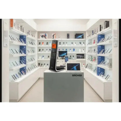 Telefono Cordless Brondi esposto in una vetrina moderna con altri dispositivi tecnologici