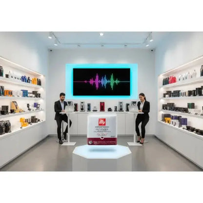 Negozio Illy con capsule e attrezzature per caffè in un ambiente moderno