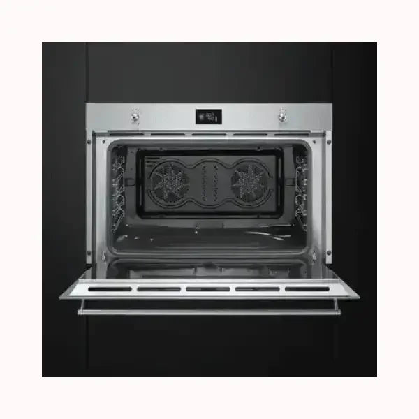 Forno SMEG da incasso in acciaio inox moderno con porta aperta e interno spazioso