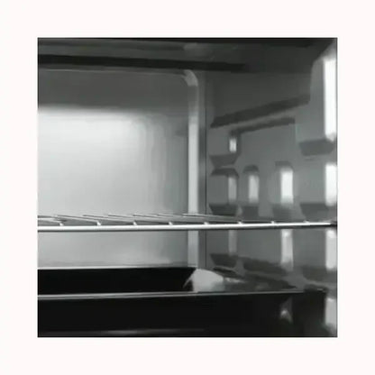 Interno del fornetto Princess con griglia e teglia in acciaio per cottura efficiente TRISTAR