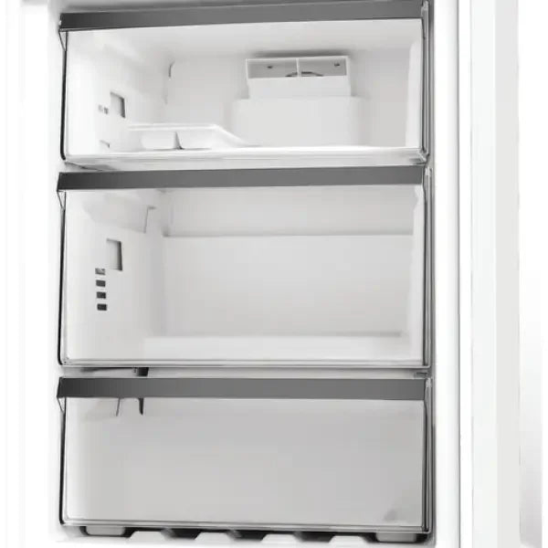 Interno di frigo combinato Whirlpool con cassetti trasparenti per conservazione alimenti