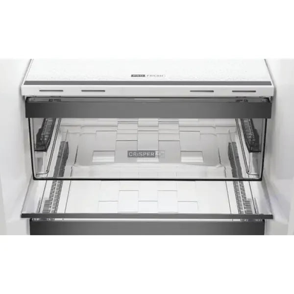 Cassetto interno trasparente di frigorifero Whirlpool per conservare alimenti freschi