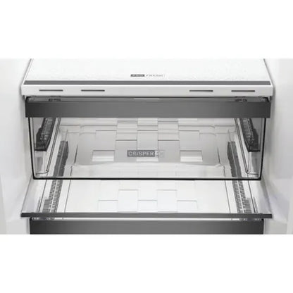 Cassetto interno trasparente di frigorifero Whirlpool per conservare alimenti freschi